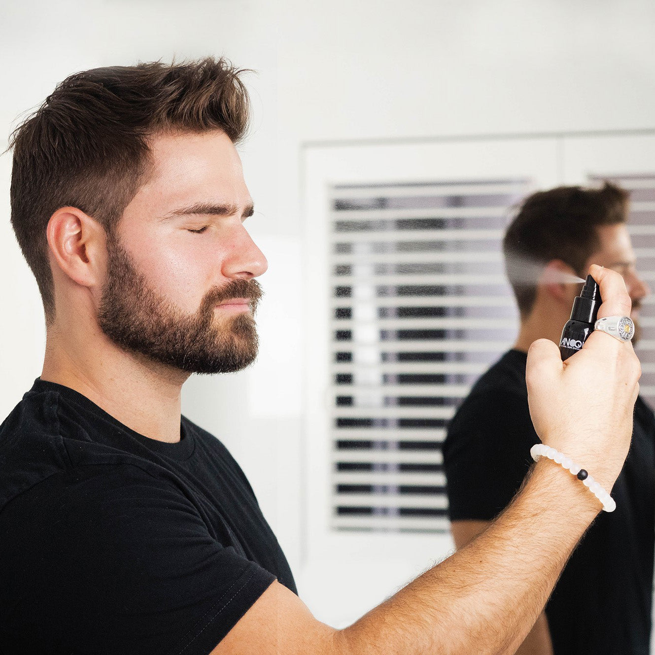 Chris spraying Anoque Alpha Toner